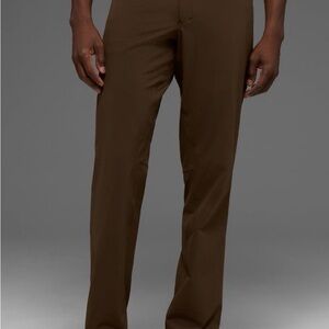 ALO Yoga Men's day and night pant size 34R. Espresso color NEW with tag